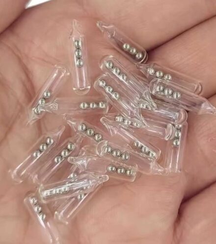 Identifying Small Glass Tubes Containing Three Tiny Ball Bearings